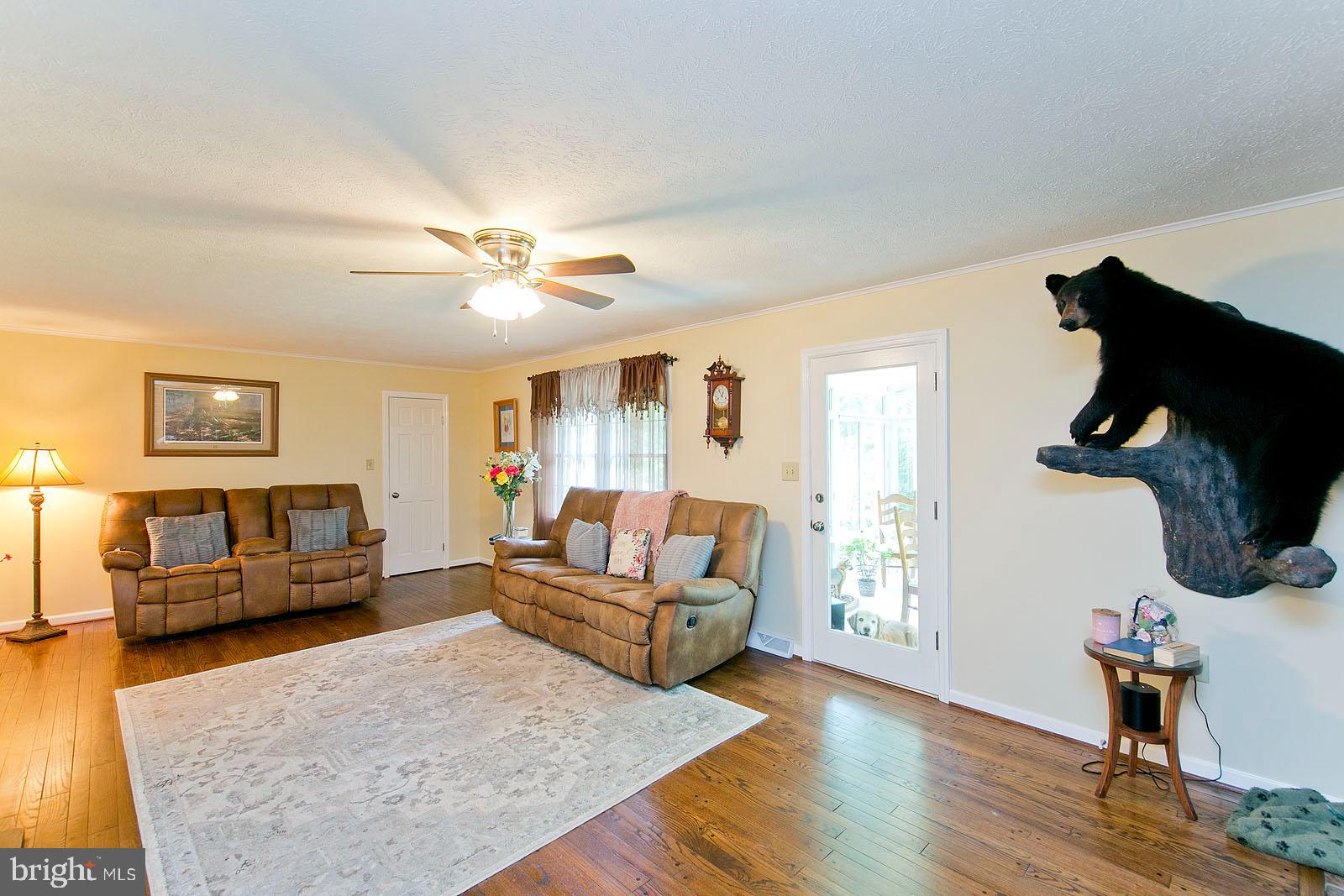 2521 Jones Road Winchester, VA 22602 - Photo 20 of 56 Back family room with entrance to sunroom
