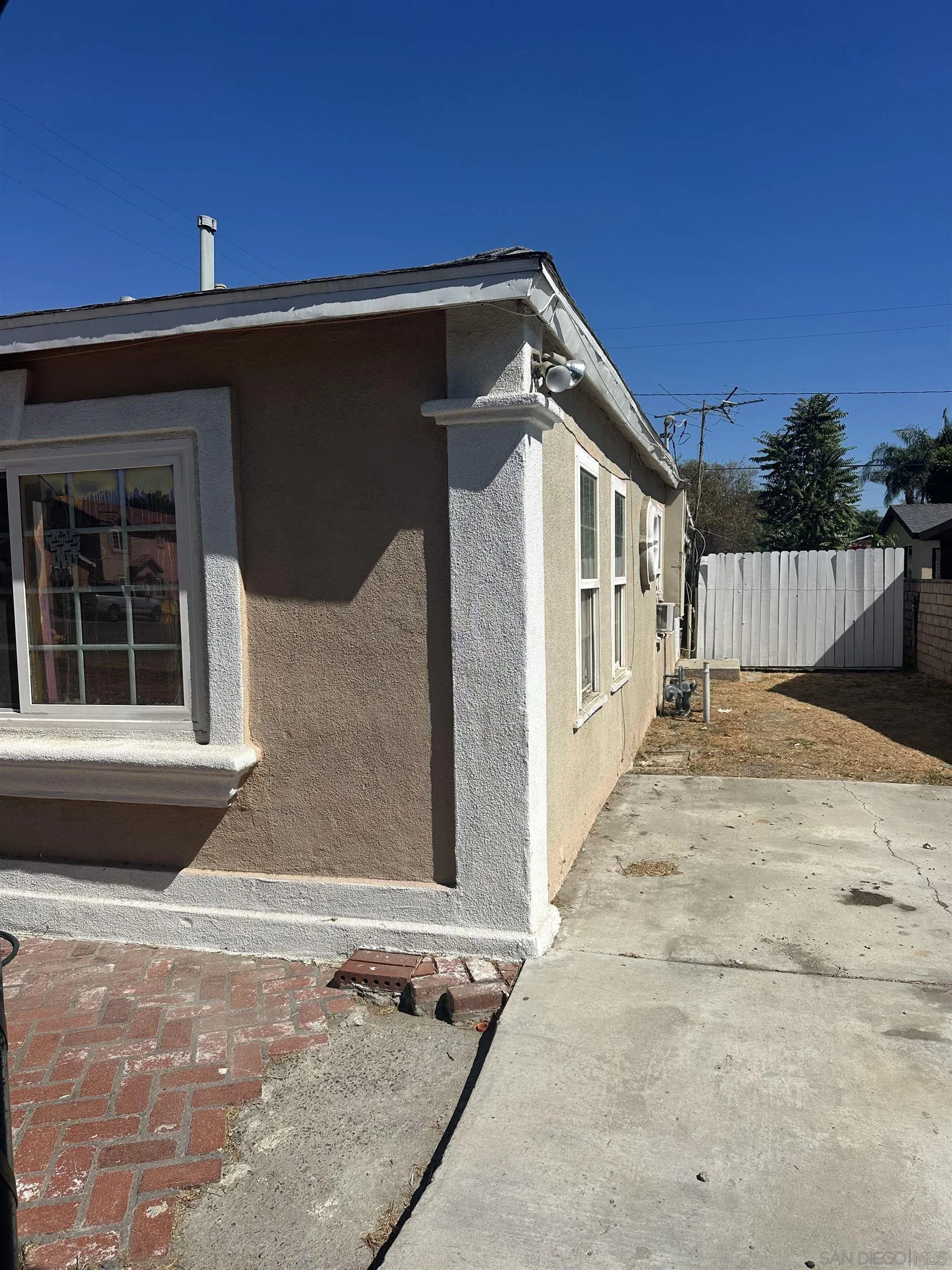 5295 36th Street Riverside, CA 92509 - Photo 2 of 7 a front view of a house with a garage