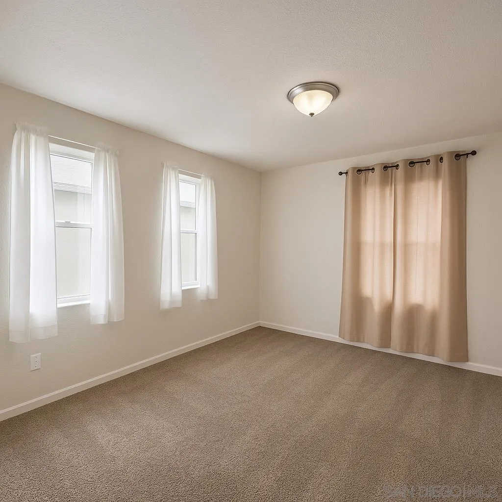 5295 36th Street Riverside, CA 92509 - Photo 3 of 7 a view of an empty room with a window