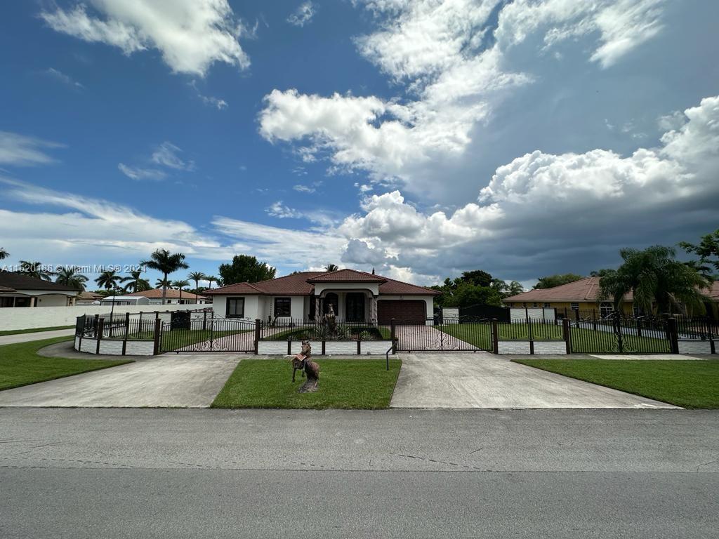 13430 Southwest 192nd Street Miami, FL 33177 - Photo 5 of 37 a view of a park with houses