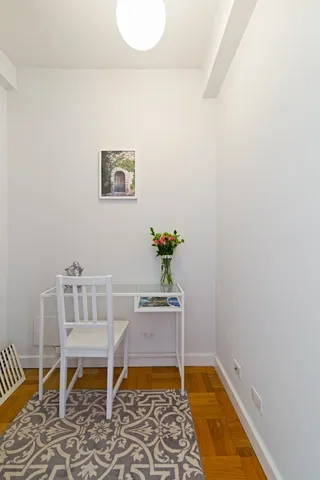 a dining room with a table and chair