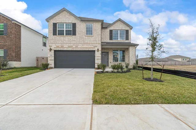 a house view with a garden space