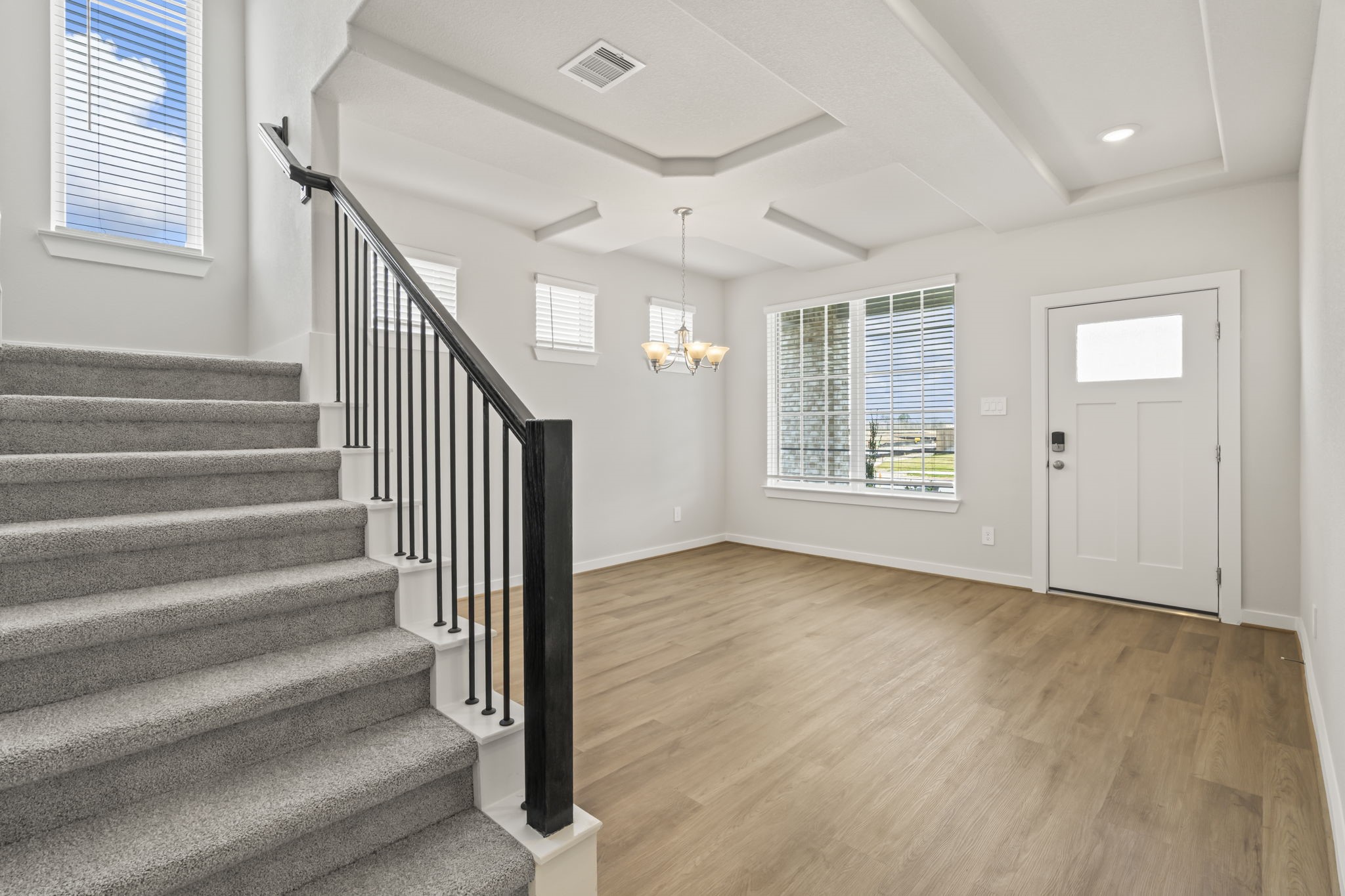 6606 Lenwood Lane Rosharon, TX 77583 - Photo 12 of 33 a view of an entryway with wooden floor and windows
