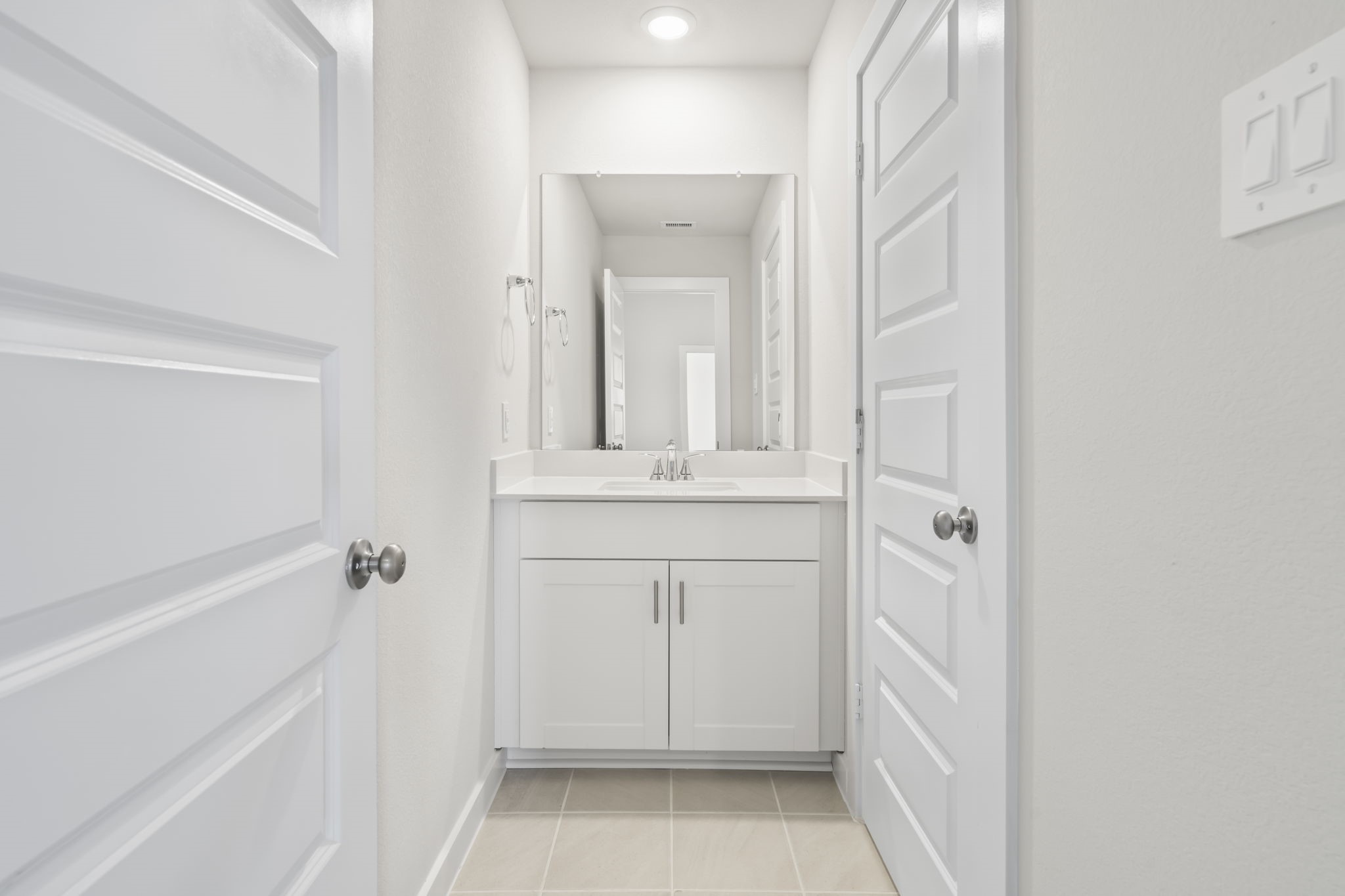6606 Lenwood Lane Rosharon, TX 77583 - Photo 18 of 33 a bathroom with a sink vanity and a mirror