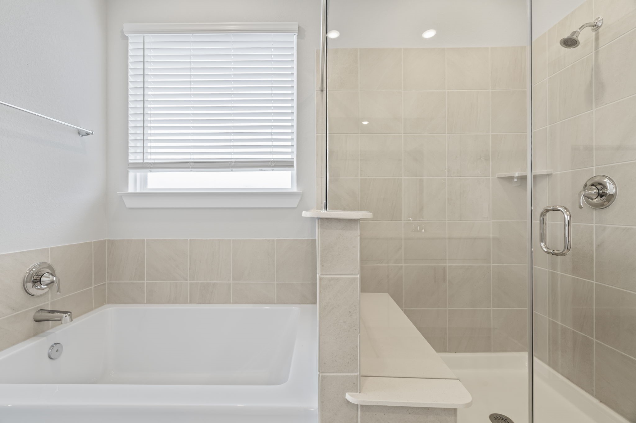 6606 Lenwood Lane Rosharon, TX 77583 - Photo 26 of 33 a bathroom with a bathtub and shower