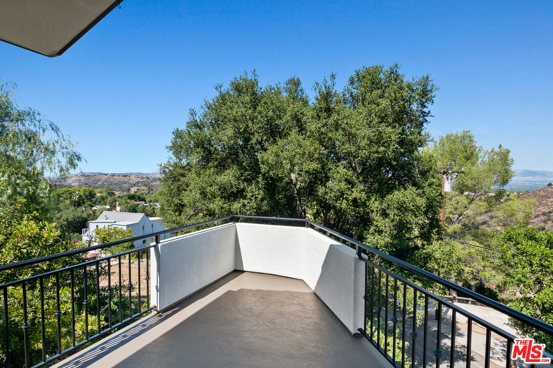 23550 Valley View Road Calabasas, CA 91302 - Photo 15 of 24 a balcony with an outdoor space