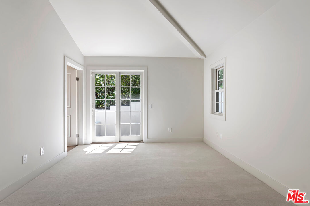 23550 Valley View Road Calabasas, CA 91302 - Photo 18 of 24 an empty room with windows