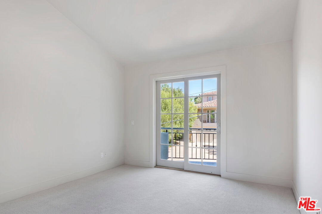 23550 Valley View Road Calabasas, CA 91302 - Photo 19 of 24 a view of an empty room with a window