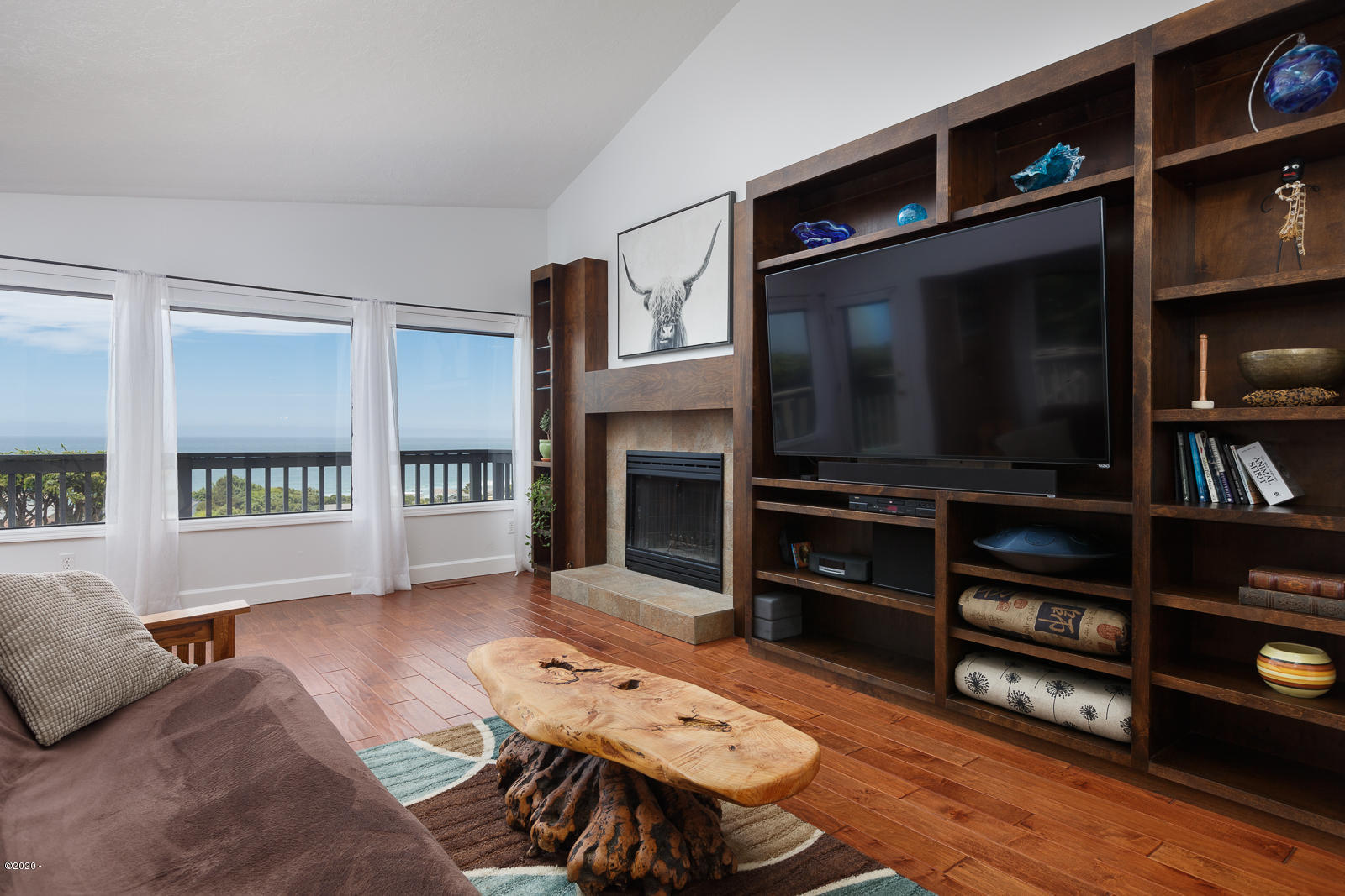 5277 Northwest Logan Road Lincoln City, OR 97367 - Photo 11 of 19 Built ins and gas/wood fireplace