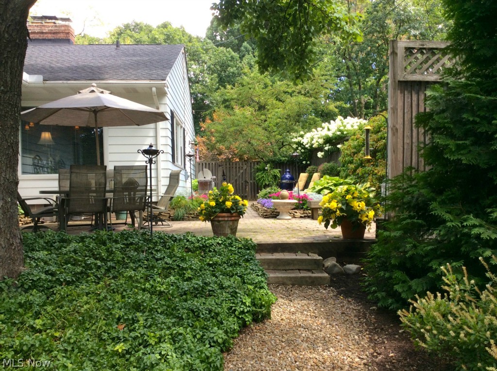 414 Somerset Road Akron, OH 44313 - Photo 25 of 25 Secluded patio with dining area, grill space and room to lounge…all to the soothing sounds of a water feature