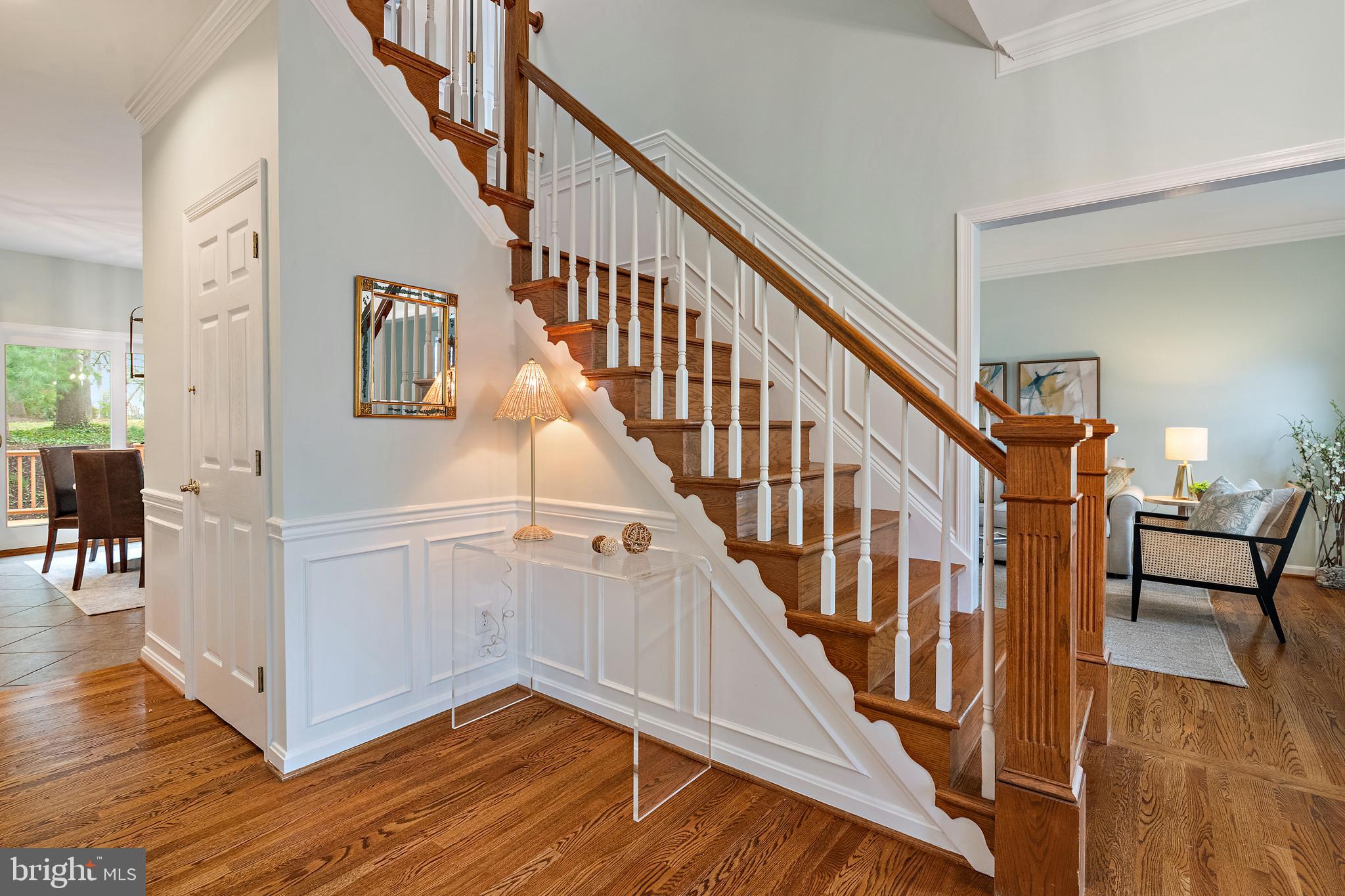 150 South River Landing Road Edgewater, MD 21037 - Photo 7 of 50 a view of staircase with wooden floor and a chandelier