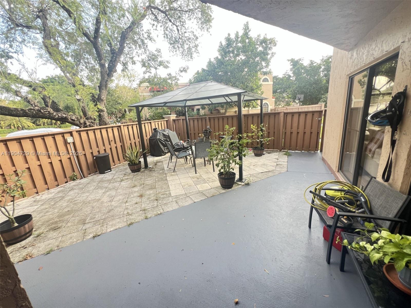 8116 Severn Drive, Unit C Boca Raton, FL 33433 - Photo 3 of 19 a view of outdoor space with seating