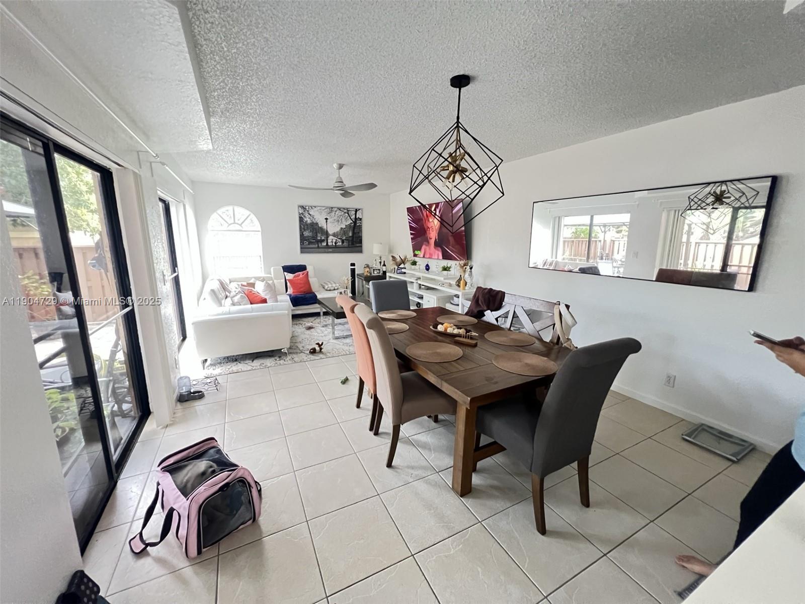 8116 Severn Drive, Unit C Boca Raton, FL 33433 - Photo 7 of 19 a view of a livingroom and dining room