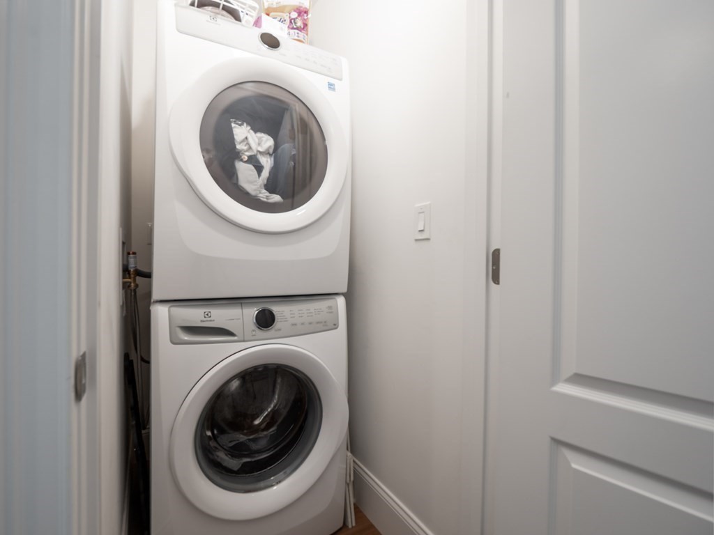 45 L Street, Unit 21 Boston, MA 02127 - Photo 22 of 23 a utility room with dryer and washer