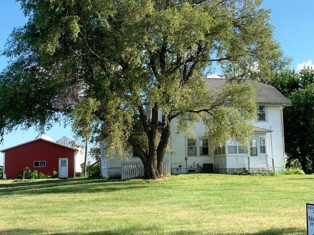 773 Sterling Road Dixon, IL 61021 - Photo 1 of 18 a front view of a house with a garden