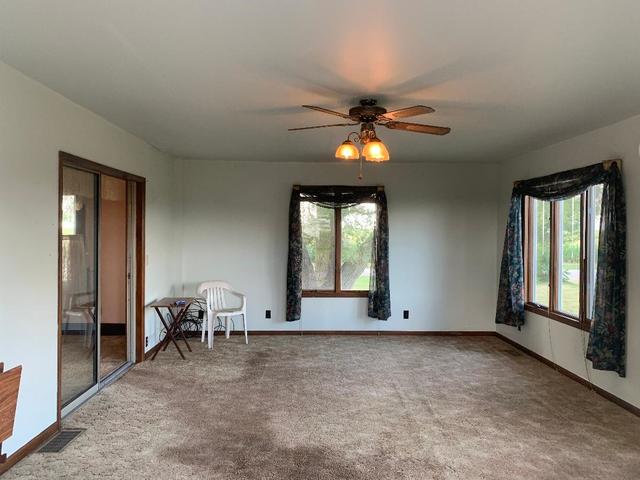 773 Sterling Road Dixon, IL 61021 - Photo 2 of 18 a view of livingroom with furniture and chandelier fan