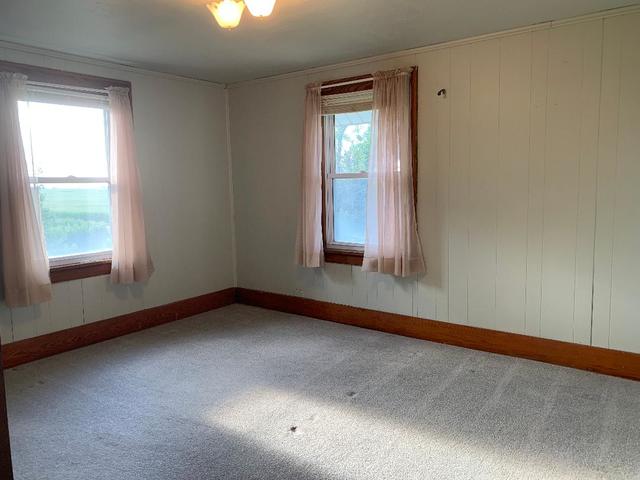 773 Sterling Road Dixon, IL 61021 - Photo 6 of 18 an empty room with a window