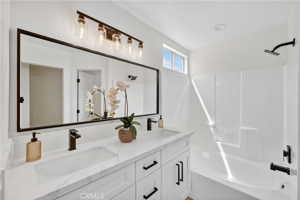 1263 Cornerstone Way Corona, CA 92878 - Photo 13 of 20 a bathroom with a sink and a mirror