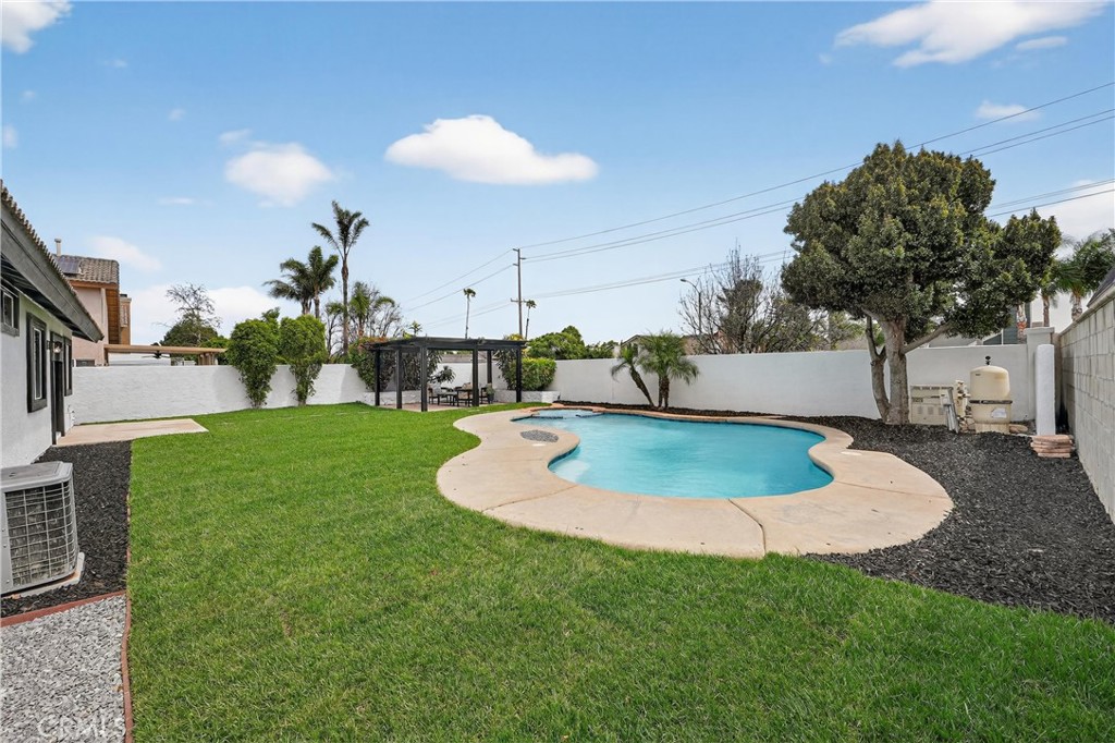 1263 Cornerstone Way Corona, CA 92878 - Photo 14 of 20 a swimming pool with outdoor seating and yard