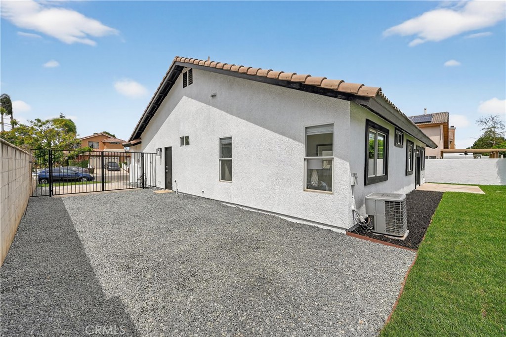 1263 Cornerstone Way Corona, CA 92878 - Photo 17 of 20 a view of house and yard with green space