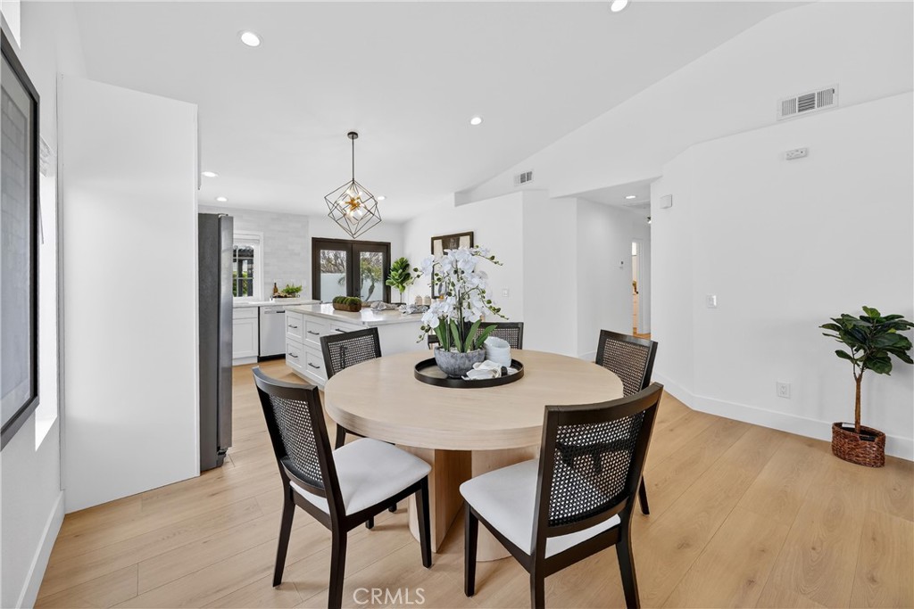1263 Cornerstone Way Corona, CA 92878 - Photo 4 of 20 a view of a dining room with furniture and wooden floor