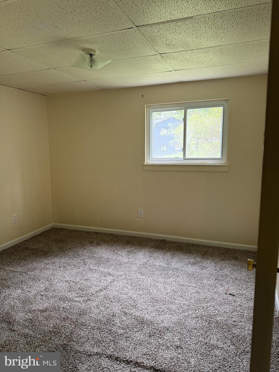 9401 Cheltenham Avenue Clinton, MD 20735 - Photo 12 of 16 a view of an empty room with a window