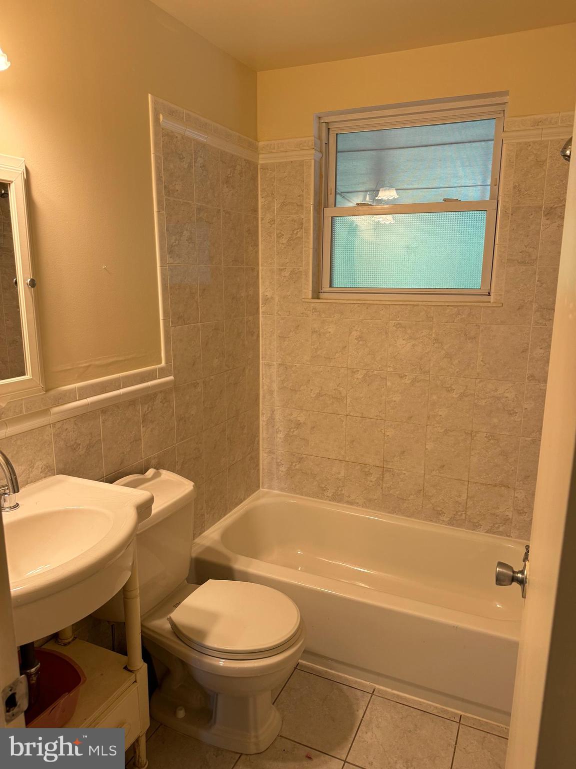 9401 Cheltenham Avenue Clinton, MD 20735 - Photo 5 of 16 a bathroom with a sink and a mirror