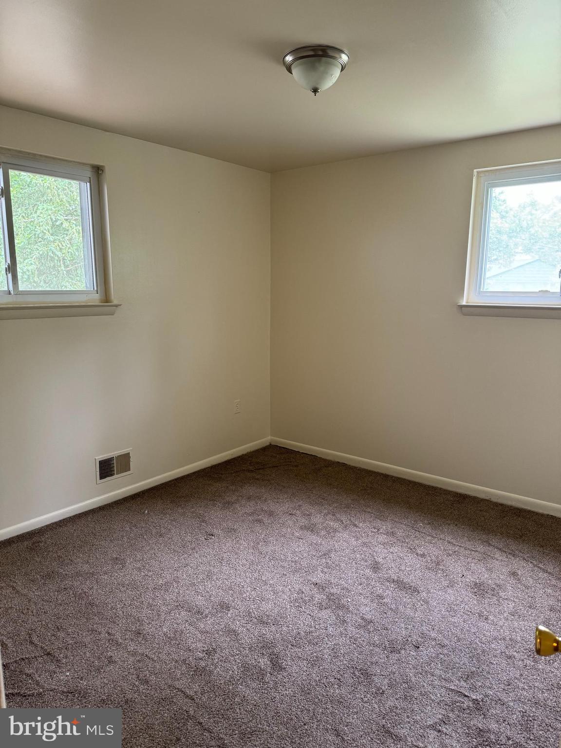 9401 Cheltenham Avenue Clinton, MD 20735 - Photo 6 of 16 an empty room with a window