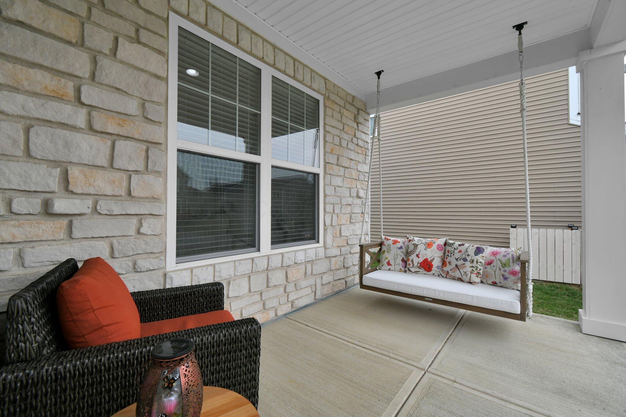 916 Rooks Circle Sunbury, OH 43074 - Photo 3 of 39 Enjoy Spring rain showers or Summer afternoons on your inviting front porch!