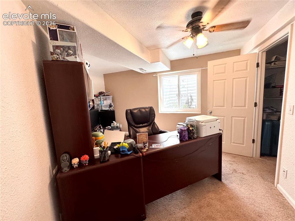 9362 St.George Road Peyton, CO 80831 - Photo 23 of 32 a dining room with furniture and window