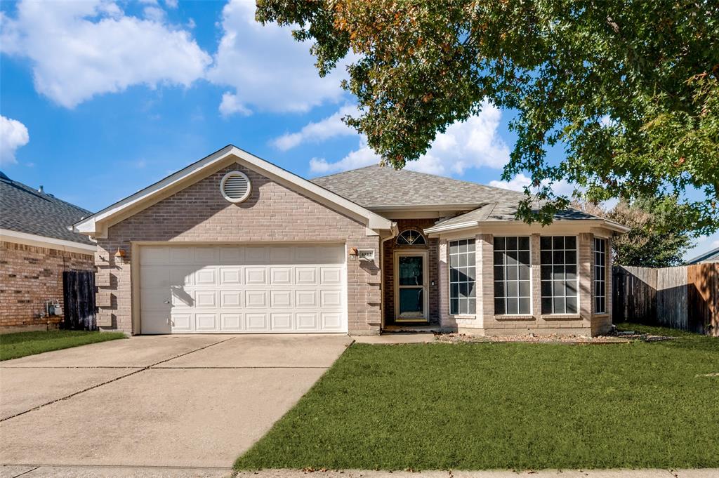 6812 Cold Water Canyon Road Fort Worth, TX 76132 - Photo 1 of 12 a front view of a house with a garden