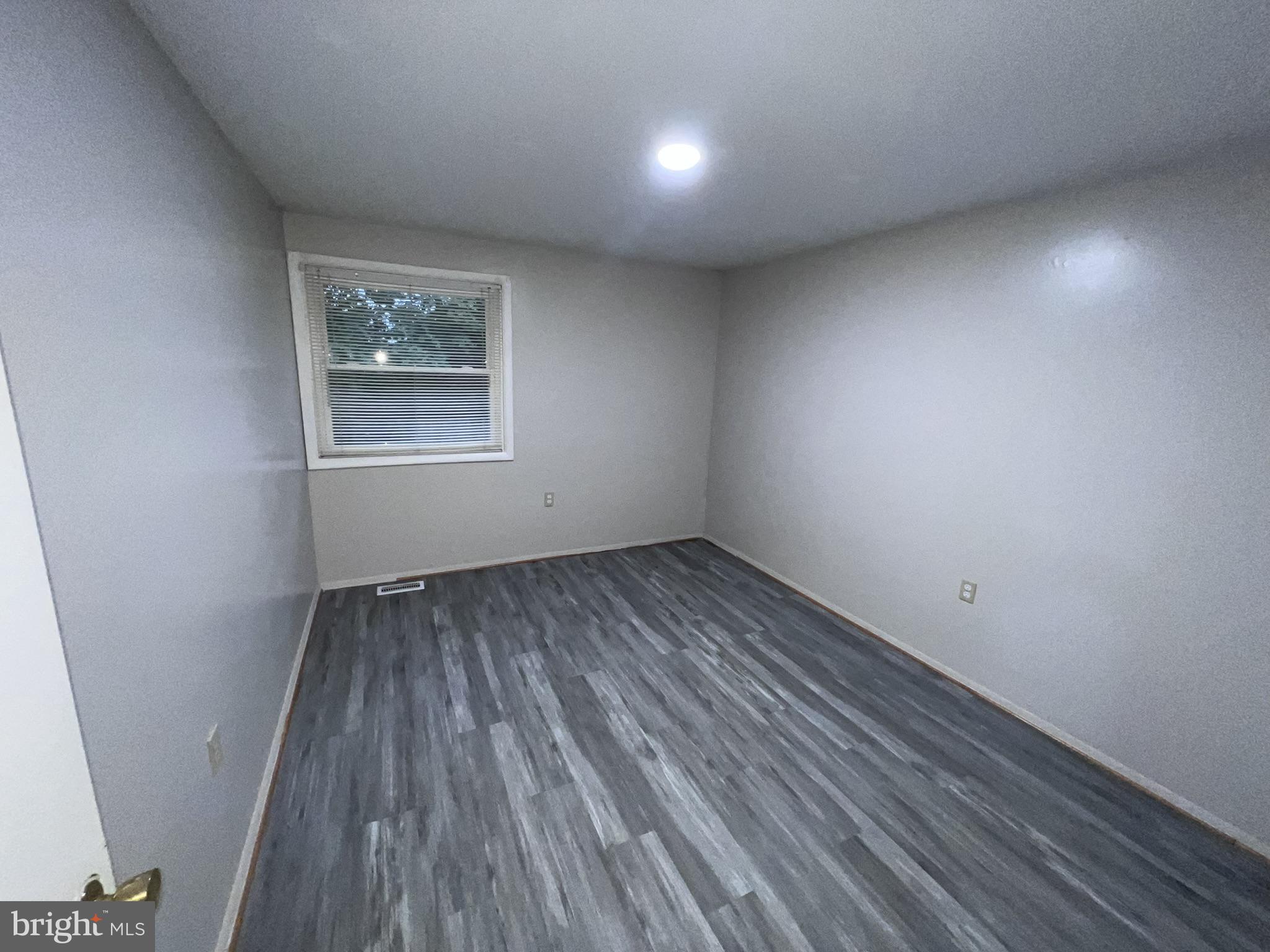 217 Haverhill Road Joppa, MD 21085 - Photo 16 of 22 Bright, airy room with modern flooring.