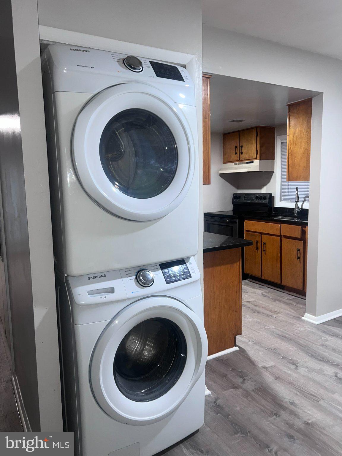 217 Haverhill Road Joppa, MD 21085 - Photo 4 of 22 Modern laundry setup in sleek design.