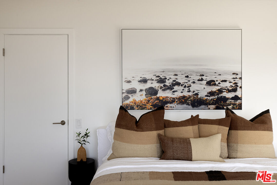 20374 Seaboard Road Malibu, CA 90265 - Photo 17 of 43 a view of a living room with furniture and floor to ceiling window