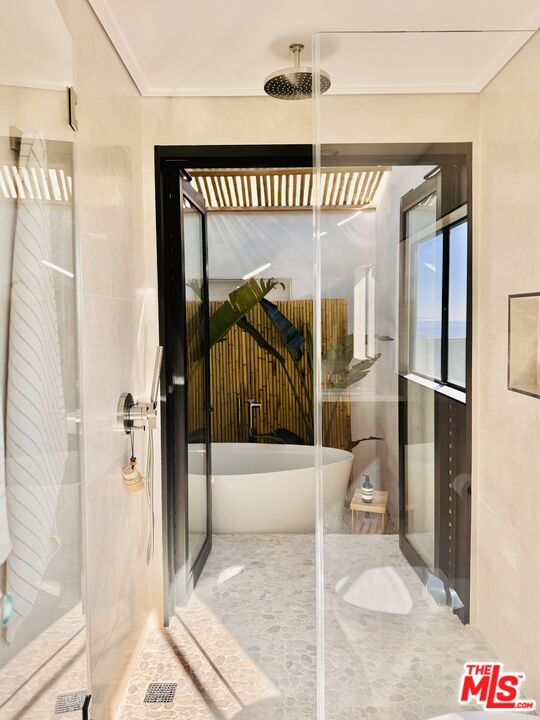 20374 Seaboard Road Malibu, CA 90265 - Photo 18 of 43 a view of a hallway to a livingroom and a furniture