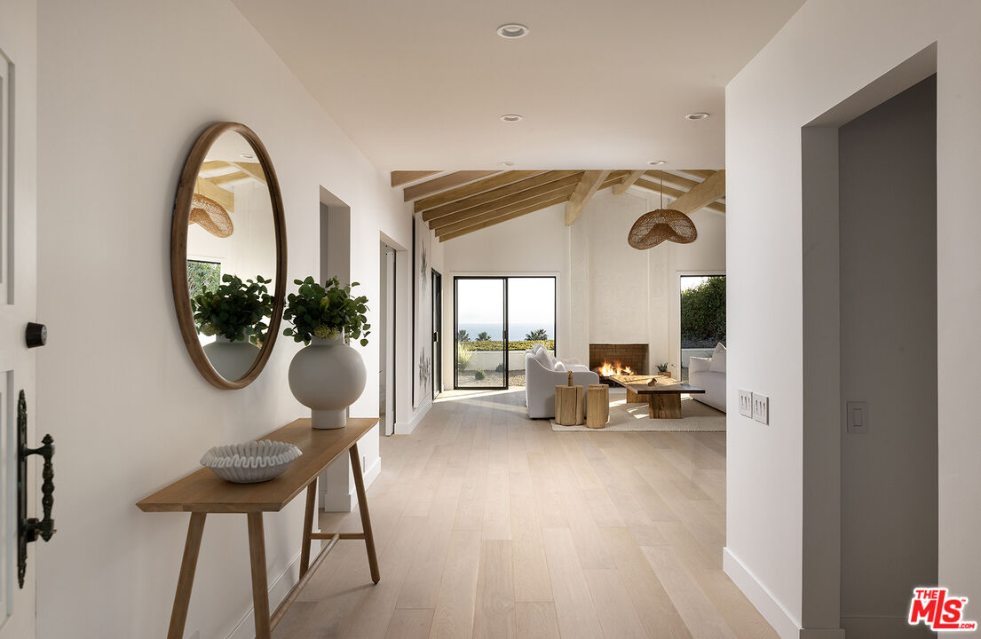 20374 Seaboard Road Malibu, CA 90265 - Photo 2 of 43 a view of living room with furniture and a large window