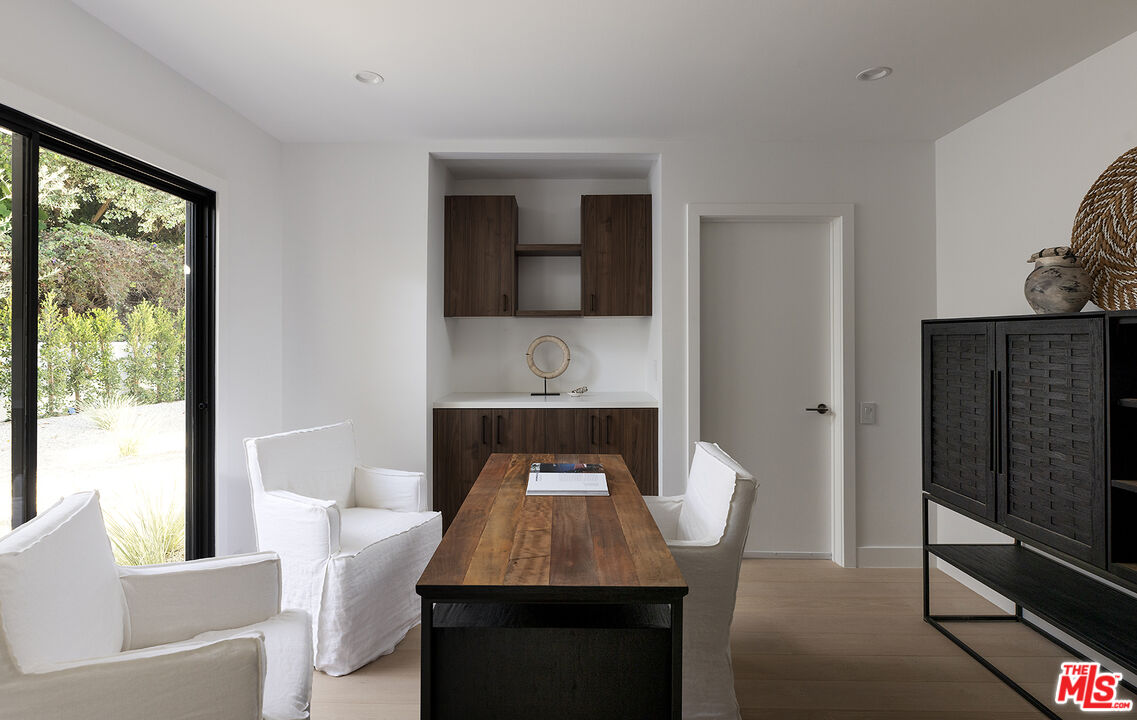 20374 Seaboard Road Malibu, CA 90265 - Photo 33 of 43 a living room with furniture and a fireplace