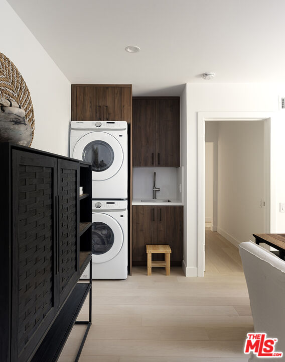 20374 Seaboard Road Malibu, CA 90265 - Photo 34 of 43 a utility room with sink dryer and washer