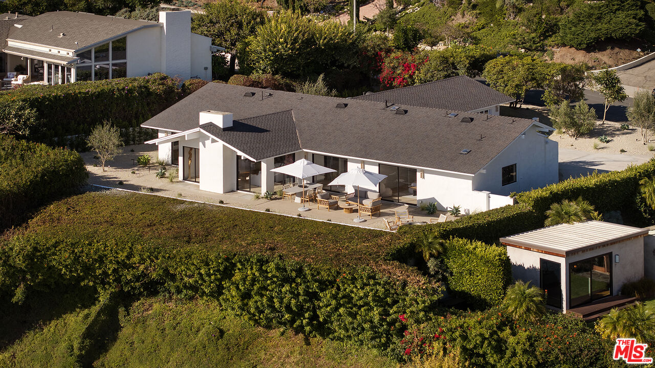 20374 Seaboard Road Malibu, CA 90265 - Photo 37 of 43 an aerial view of multiple houses with a yard