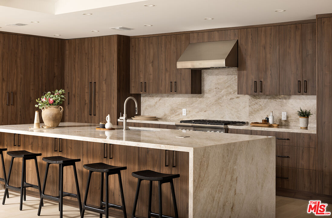 20374 Seaboard Road Malibu, CA 90265 - Photo 5 of 43 a kitchen with a sink cabinets and window