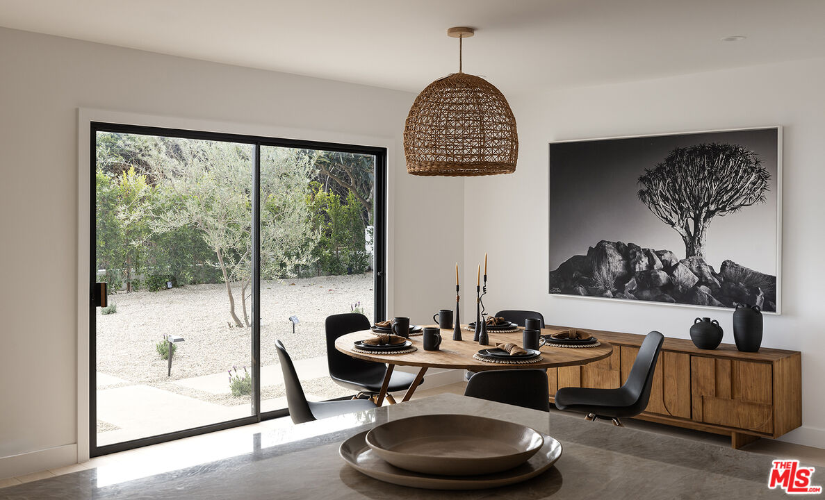 20374 Seaboard Road Malibu, CA 90265 - Photo 10 of 43 a living room with furniture and a window