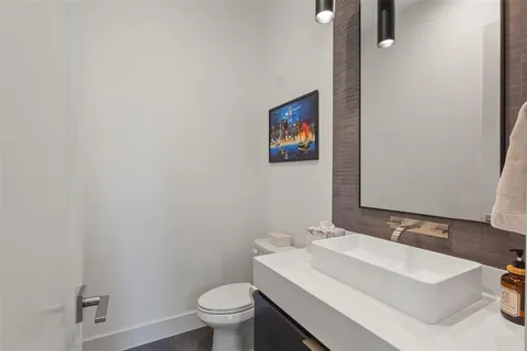 a bathroom with a sink and a toilet