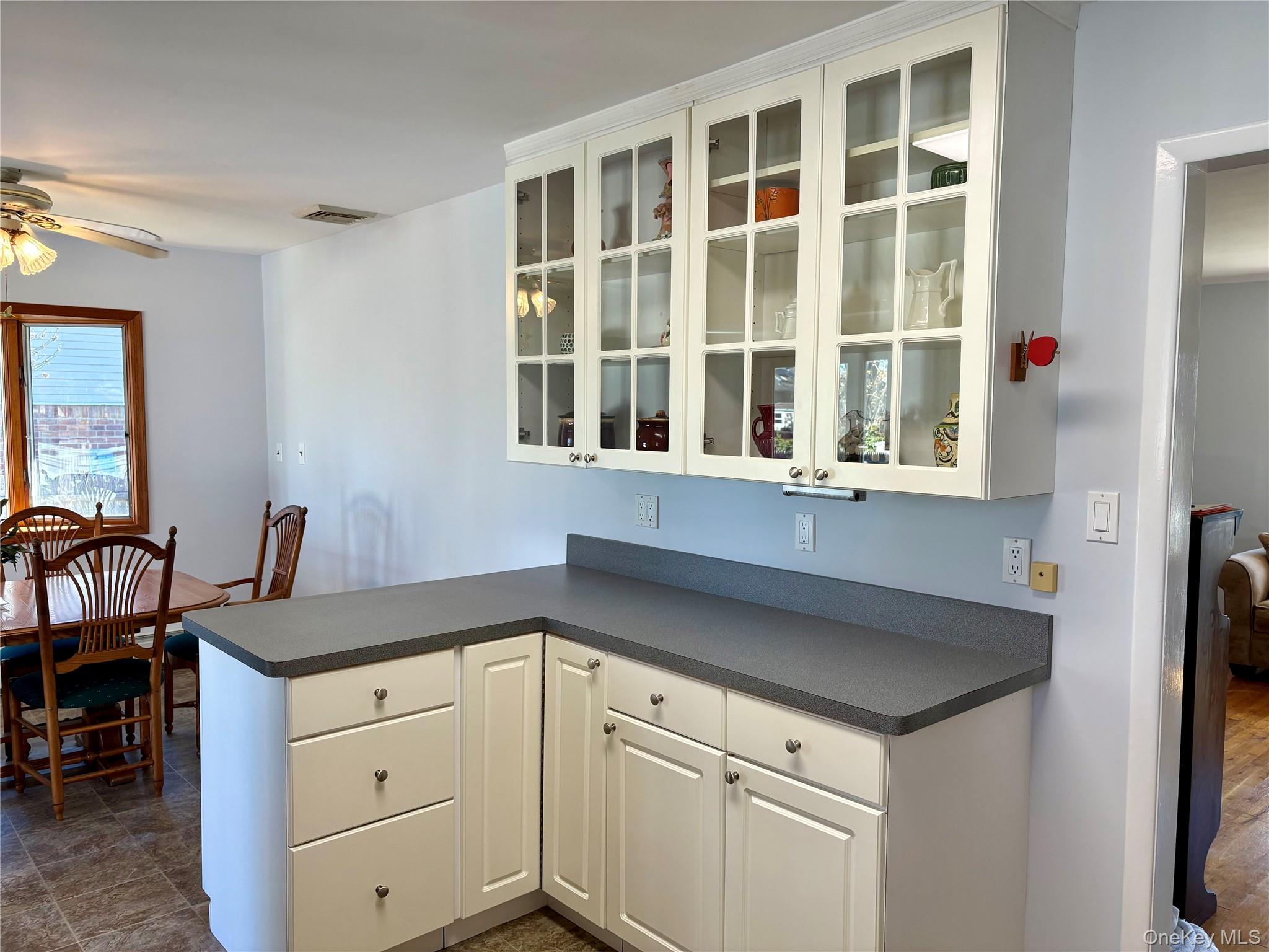 223 Timber Point Road East Islip, NY 11730 - Photo 13 of 47 a kitchen with a sink and a window