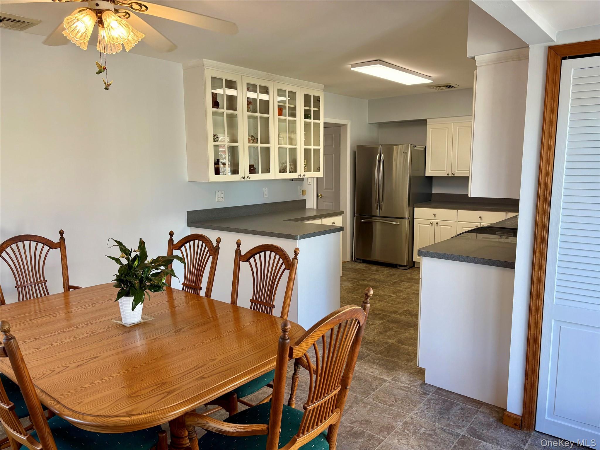 223 Timber Point Road East Islip, NY 11730 - Photo 17 of 47 a dining room with furniture and window