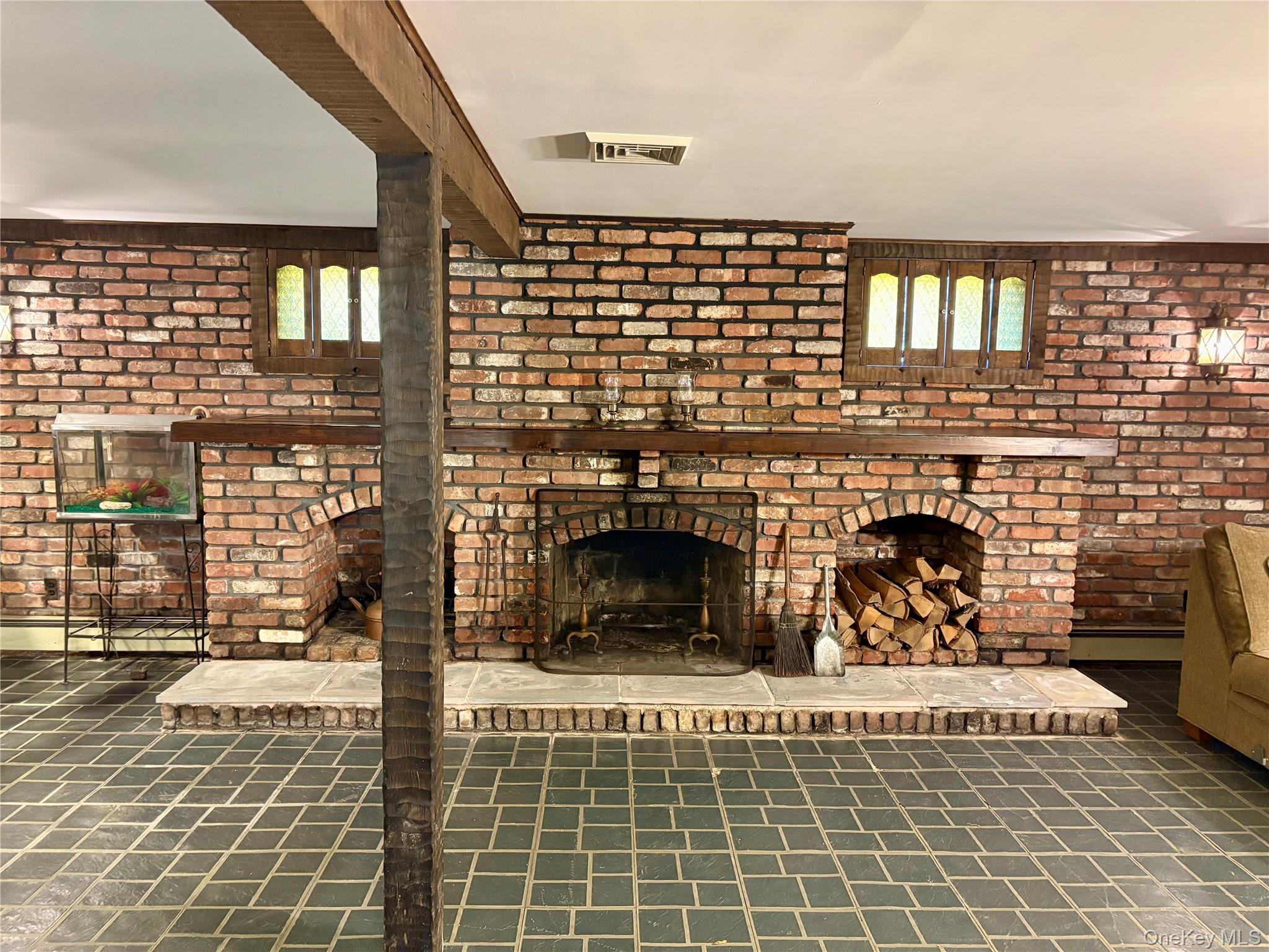 223 Timber Point Road East Islip, NY 11730 - Photo 28 of 47 a view of a living room and a fireplace
