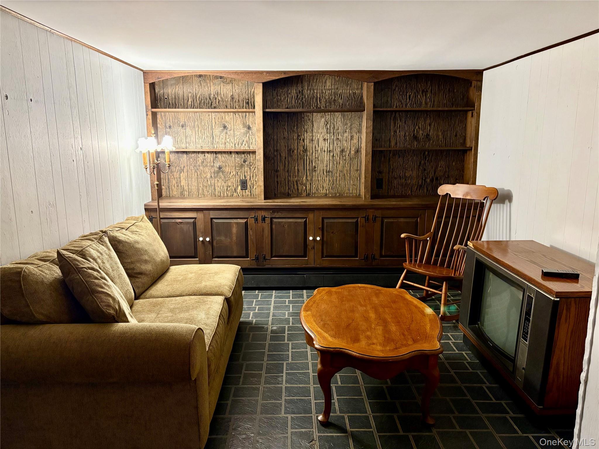 223 Timber Point Road East Islip, NY 11730 - Photo 32 of 47 a living room with furniture a window and a sink