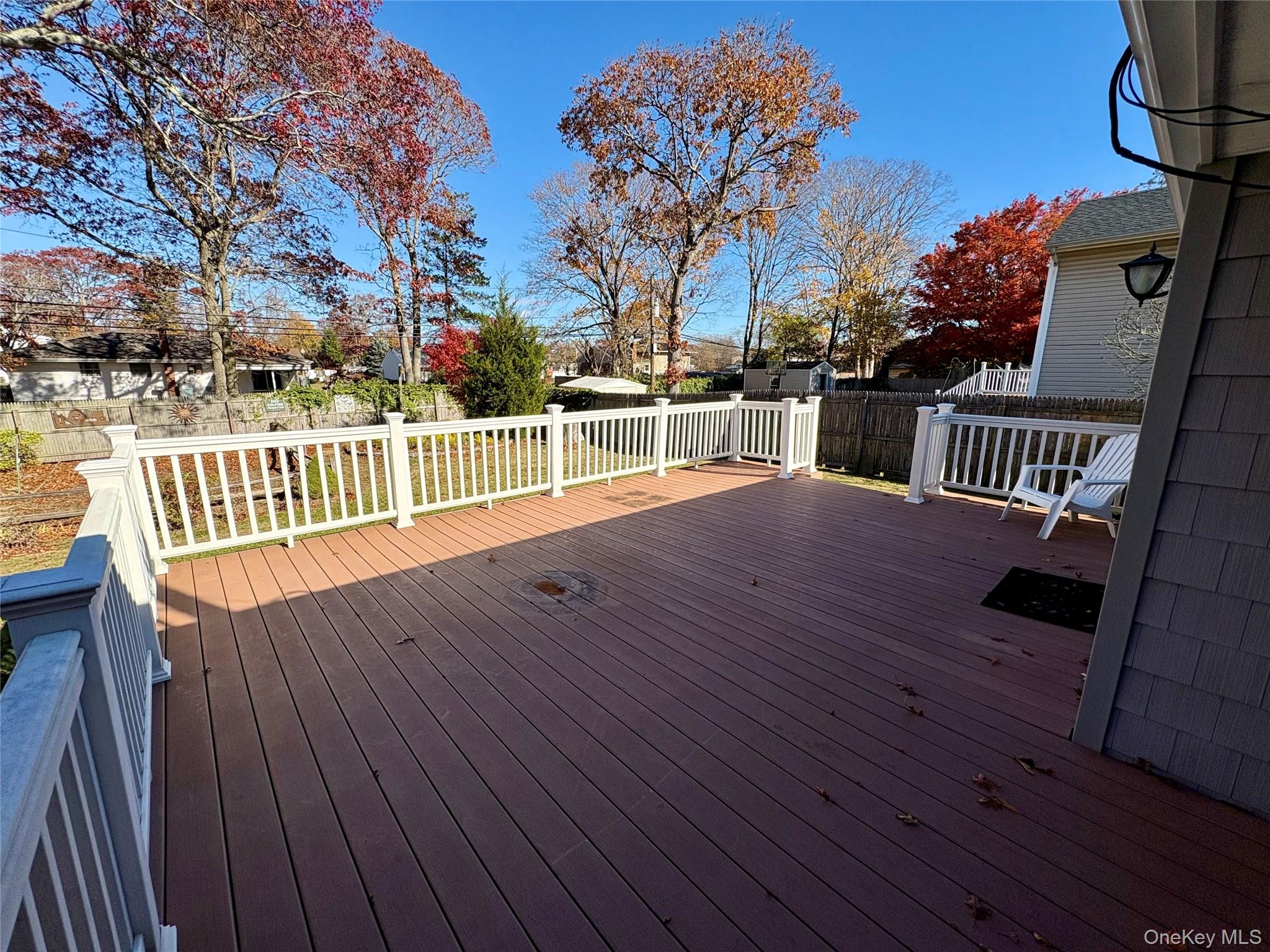 223 Timber Point Road East Islip, NY 11730 - Photo 40 of 47 a view of balcony with wooden floor and fence