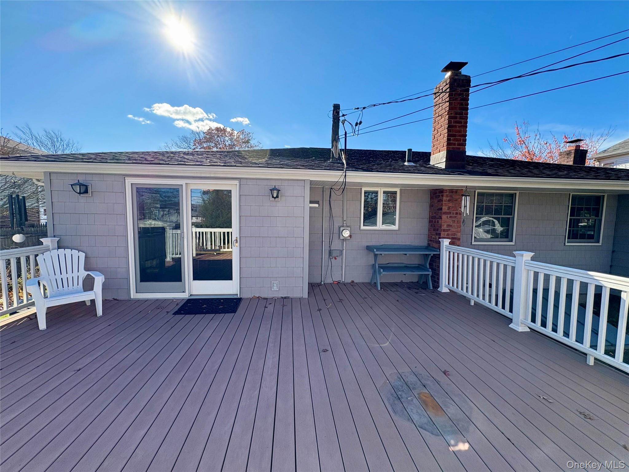223 Timber Point Road East Islip, NY 11730 - Photo 42 of 47 a view of a house with a deck and wooden floor
