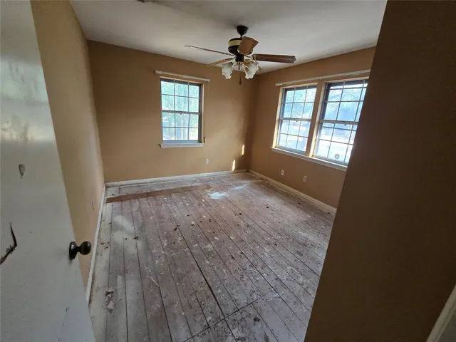 a bathroom with a sink and shower