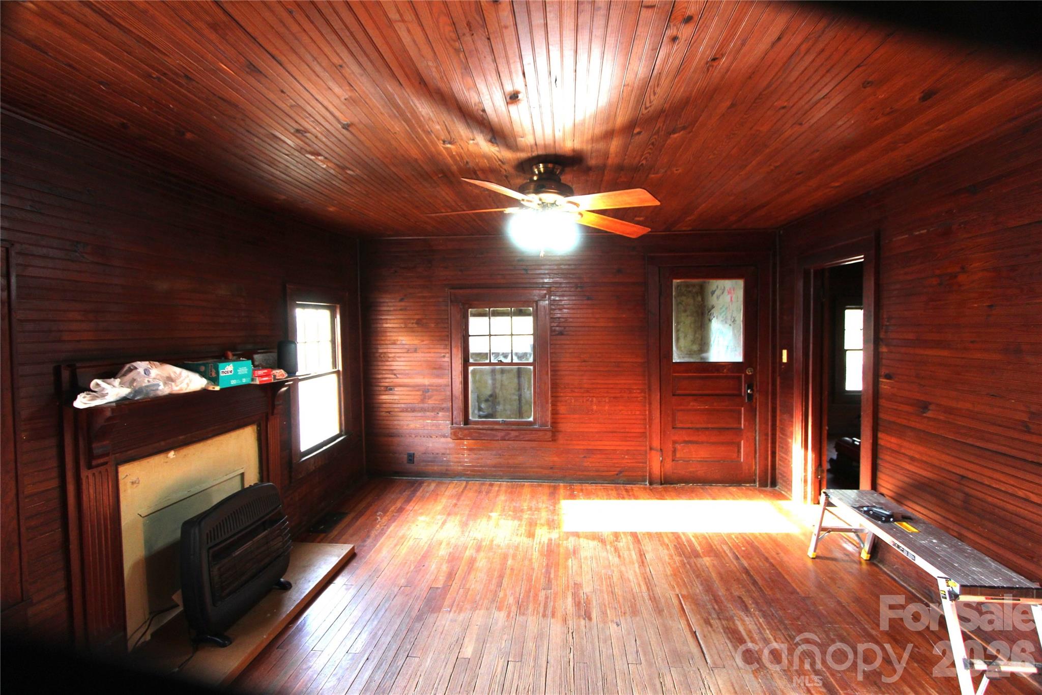 4912 Gable Road Charlotte, NC 28273 - Photo 7 of 10 a view of empty room with wooden floor and fan